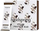 foodspring Veganer Protein Riegel, 12 x 60g, Schokolade Mandel, Rein pflanzlicher Protein Bar ohne künstliche Aromen, wenig Zucker und hoher Proteingehalt